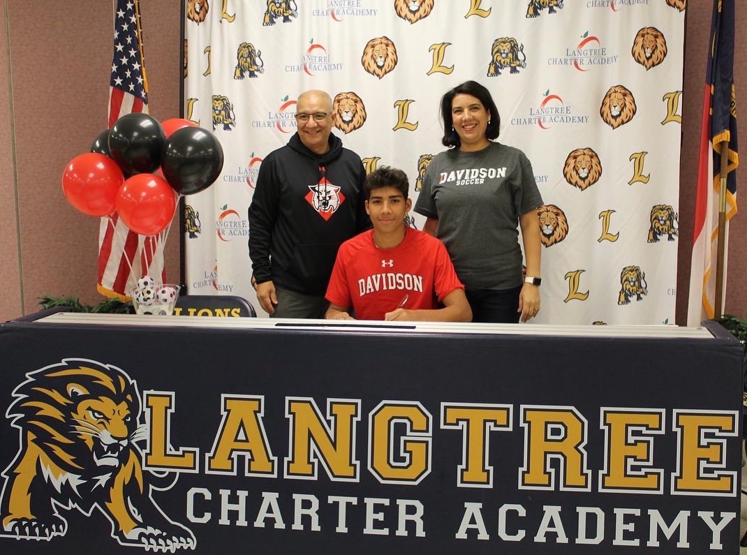 Langtreesoccer's tweet photo. It’s official! Congrats Ayman Maadir! We are so proud of you! @DavidsonCollege @DavidsonWildcat ❤️🖤🐈‍⬛⚽️ https://t.co/78zsci8ELf