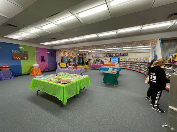 The Neosho Middle School Great Room has turned into a reading wonderland for their annual book fair! 📚 
Shoutout to Mrs. Qualls and Mrs. Owens for the amazing transformation. Students are eyeing which books they want to read next!