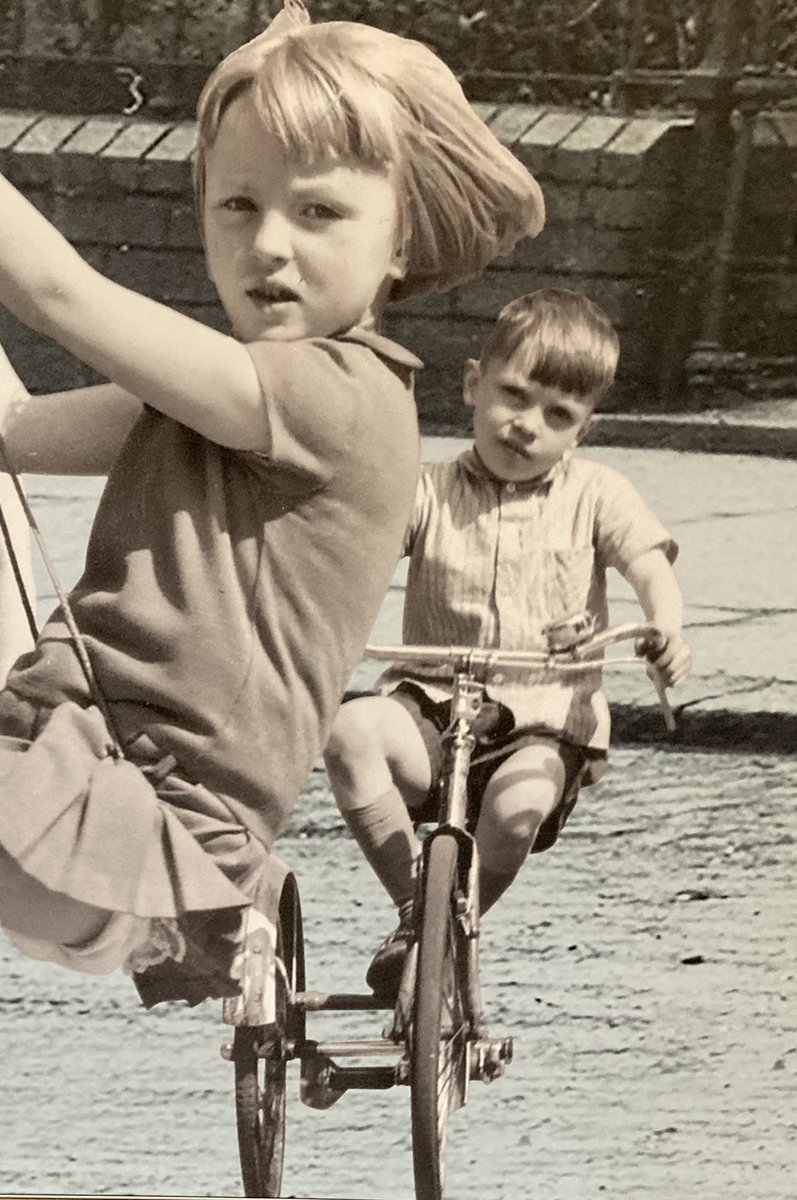 want_away's tweet image. #cycling #bicycle #cycleuk #betterbybike #loveyourbike #belfast 

Saw this in an exhibit about life in Belfast in the 70s. 

Just what is that child riding?