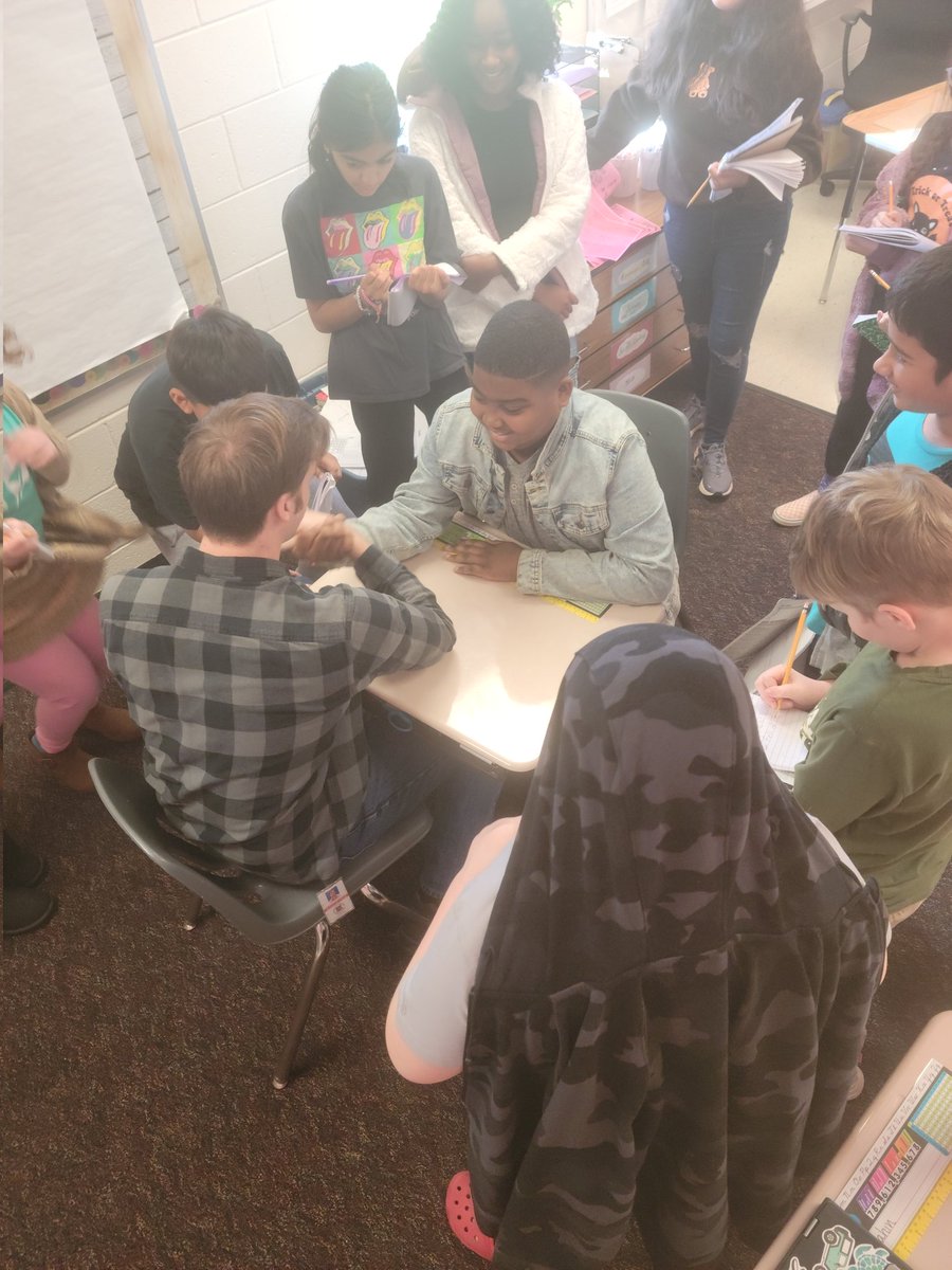 MissFlowers_MEA's tweet photo. Breaking News: An arm wrestling competition took place in room #20 today. Students got a shared experience and wrote a fast and furious news article about the experience. Safe to say this was a lot of fun! @MeadowlandElem https://t.co/DOeNB0ZKu4