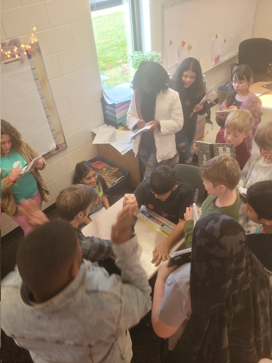 MissFlowers_MEA's tweet photo. Breaking News: An arm wrestling competition took place in room #20 today. Students got a shared experience and wrote a fast and furious news article about the experience. Safe to say this was a lot of fun! @MeadowlandElem https://t.co/DOeNB0ZKu4