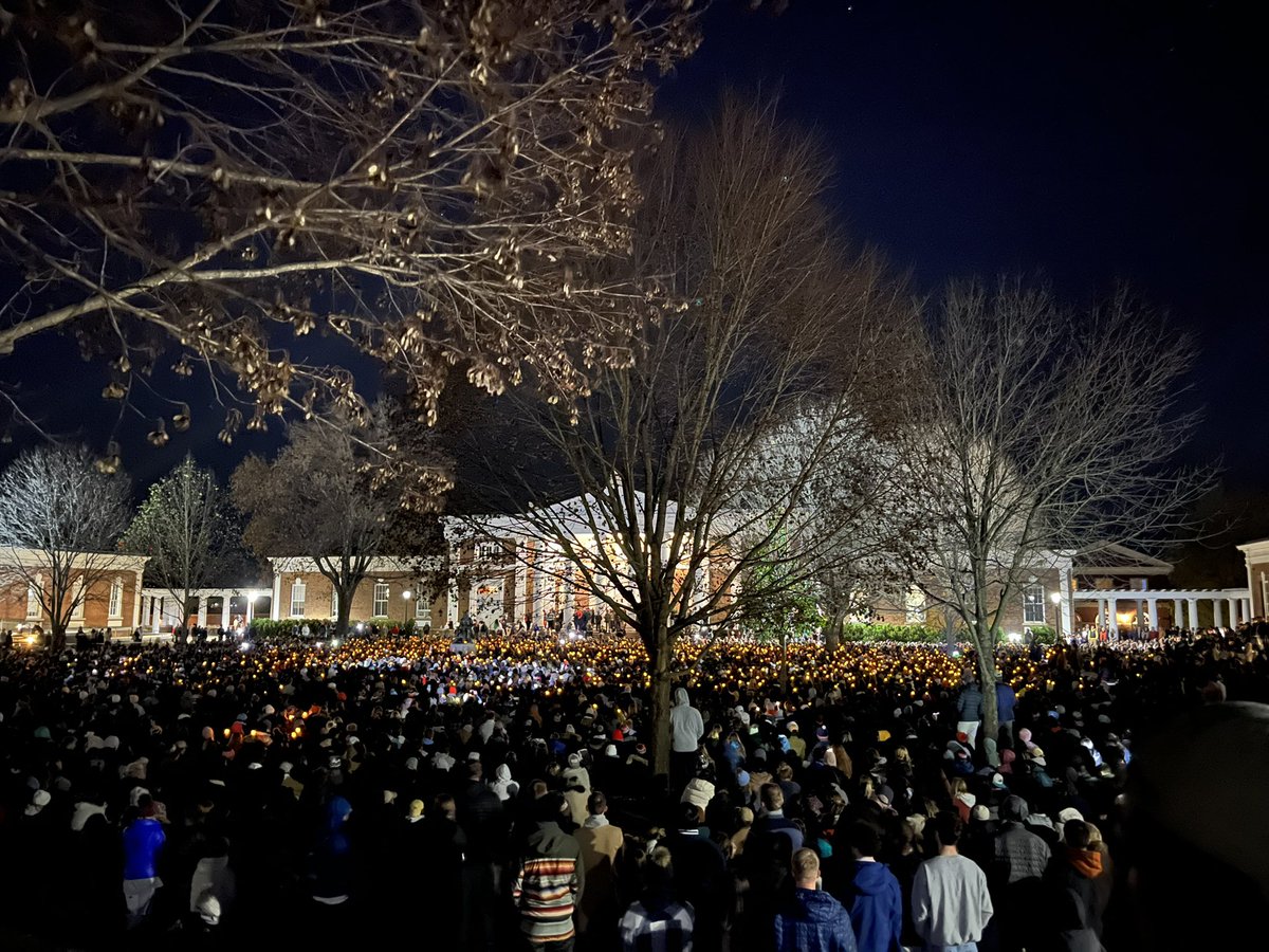 In a stunning show of solidarity during a dark day here, thousands of Virginia students have descended on the school’s South Lawn to sit in complete silence at a vigil for those killed last night. I’ve never seen anything like it.