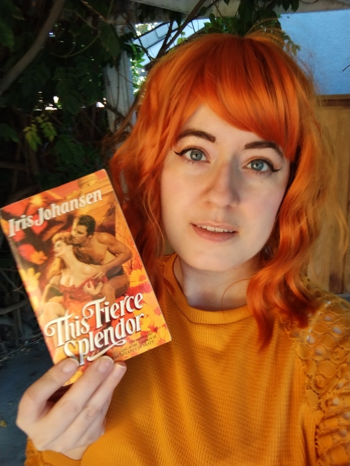 I may have color-coordinated my outfit with my romance novel 🧡