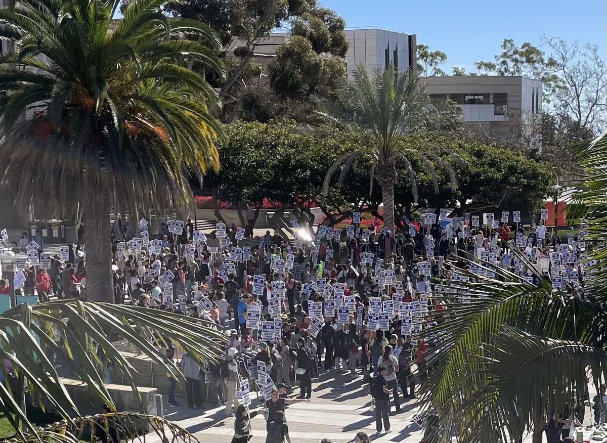 German_History's tweet photo. UCSB had a big turnout at the undergraduate rally in support of our section of the UC-wide TA &amp; Postdoc strike beginning today, for fair bargaining to get a new contract paying a living salary. Lots of faculty showed up too. (COLA: Cost of Living Adjustment) https://t.co/GaSkvCMccd