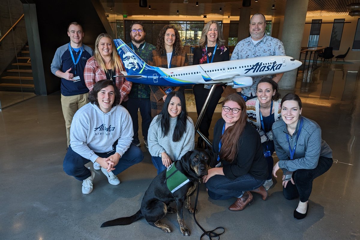 jpankow's tweet photo. Just a recruiting team doing some volunteering for Care Week at @AlaskaAir. Leroy the service dog joined us as we made dog pulls for doors, drawers, etc. #IAmAlaska https://t.co/lbtwy4361j