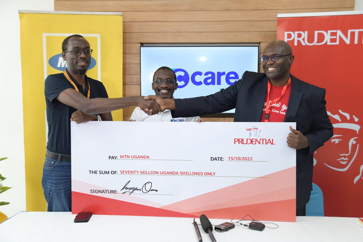 mtnug's tweet photo. Snr. Manager Brand and Comms at MTN Uganda, @buliiba(L) receives a UGX 70M cheque from @C_Care_IMC's Dr. Arthur Sesanga (C) and @PrudentialUG's Paul Nagemi(R). Runners who have paid for their #MTNMarathon2022 kits can get BMI &amp; ECG tests for free at IMC clinics to examine fitness https://t.co/t8GVjh0Xzr