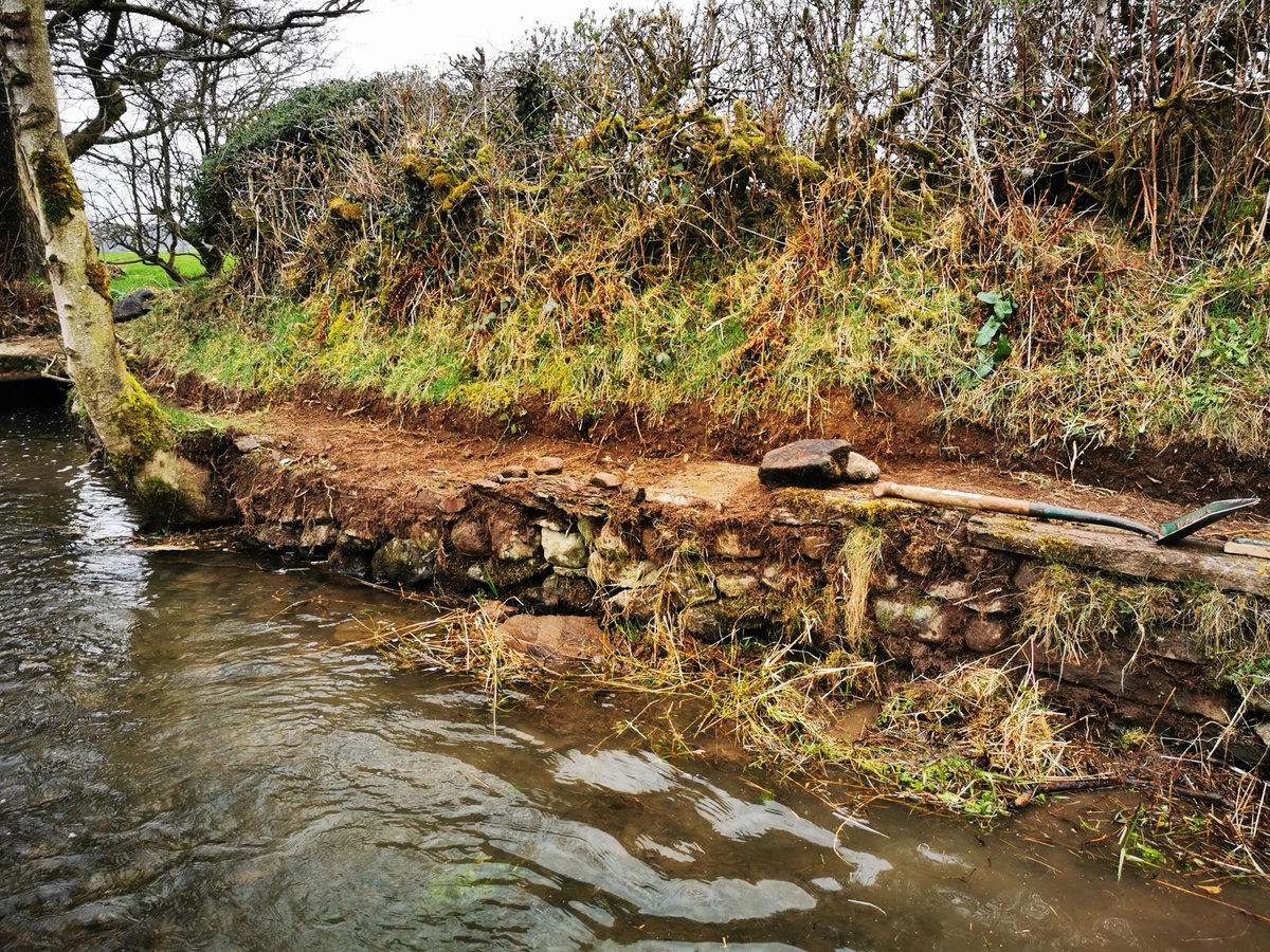 Dalesranger's tweet photo. #WesternRangers Calum and Ed have been out tackling rising water levels at #TreasonfieldFord. The Ford can be quite deep at times and due to the constriction at the bridge spreads up the track in either direction... work begins! https://t.co/Oa71fOQVyq