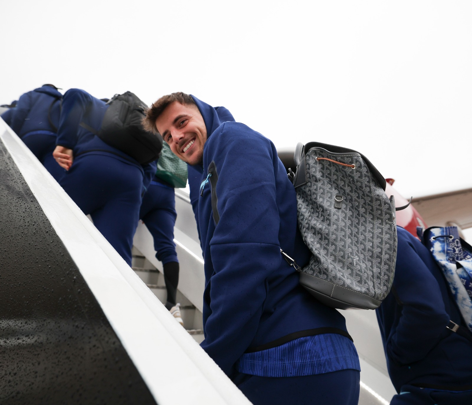 Mason Mount boards the Three Lions' plane.
