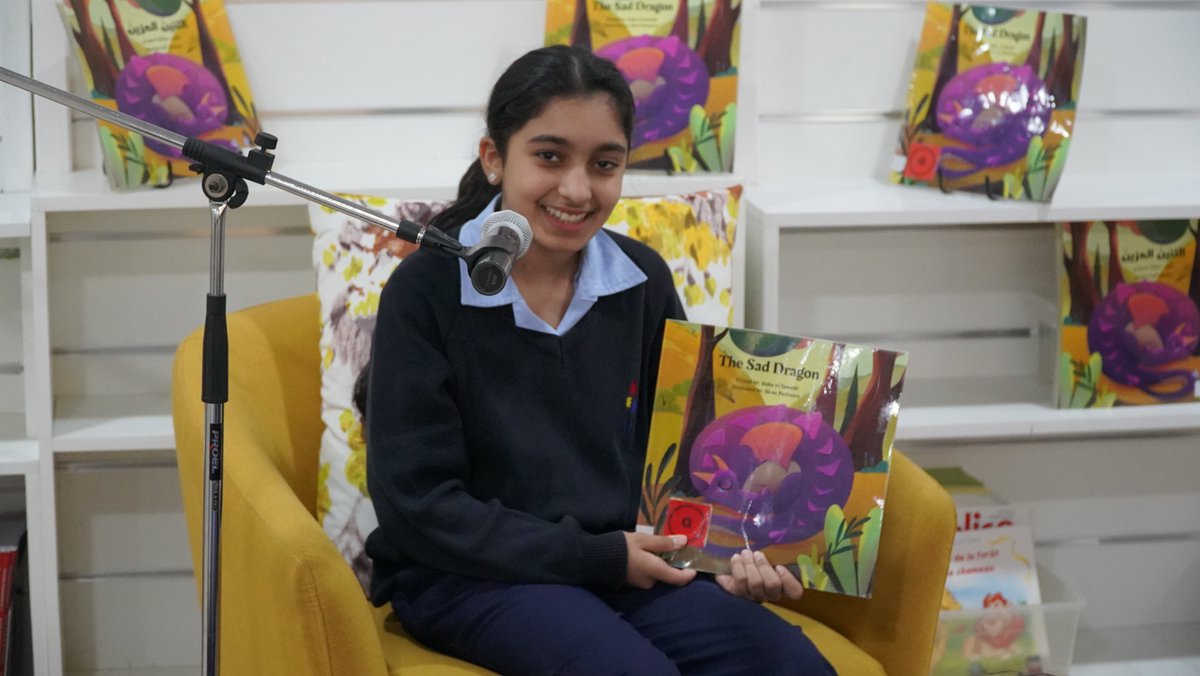AIS_SchLibrary's tweet photo. Today we launched AIS Authors with our very talented author Aisha Al Suwaidi in grade 9 who read her book The Sad Dragon to our students. Aisha wrote this book when she was 9 yrs old &amp; published it when she was 11 yrs old. What an inspiring moment for our students! #AISAuthors https://t.co/RLvfh87LVA