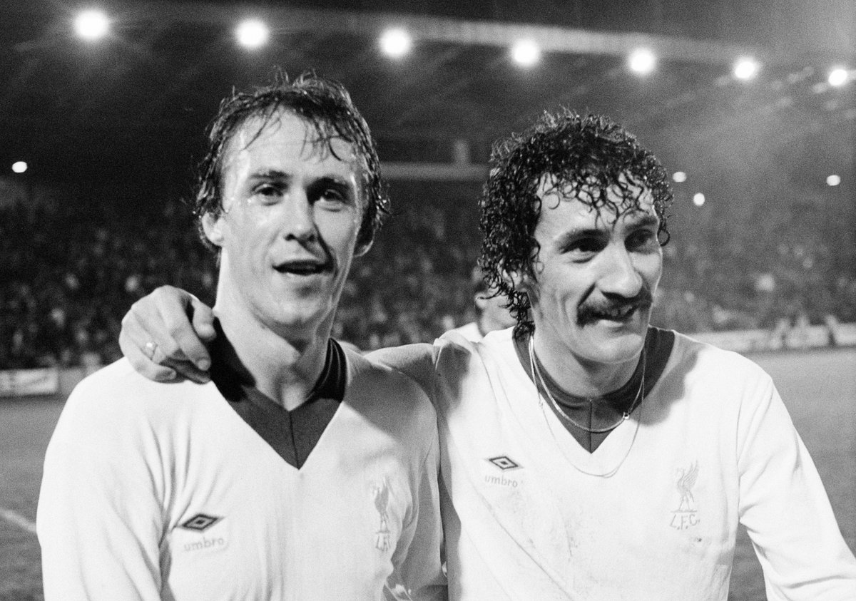 LFC's tweet image. Reds legends Phil Neal and Terry McDermott made their debuts #OnThisDay in 1974 🔴

They went on to amass an incredible 979 appearances between them and etched their names into our history 🏆