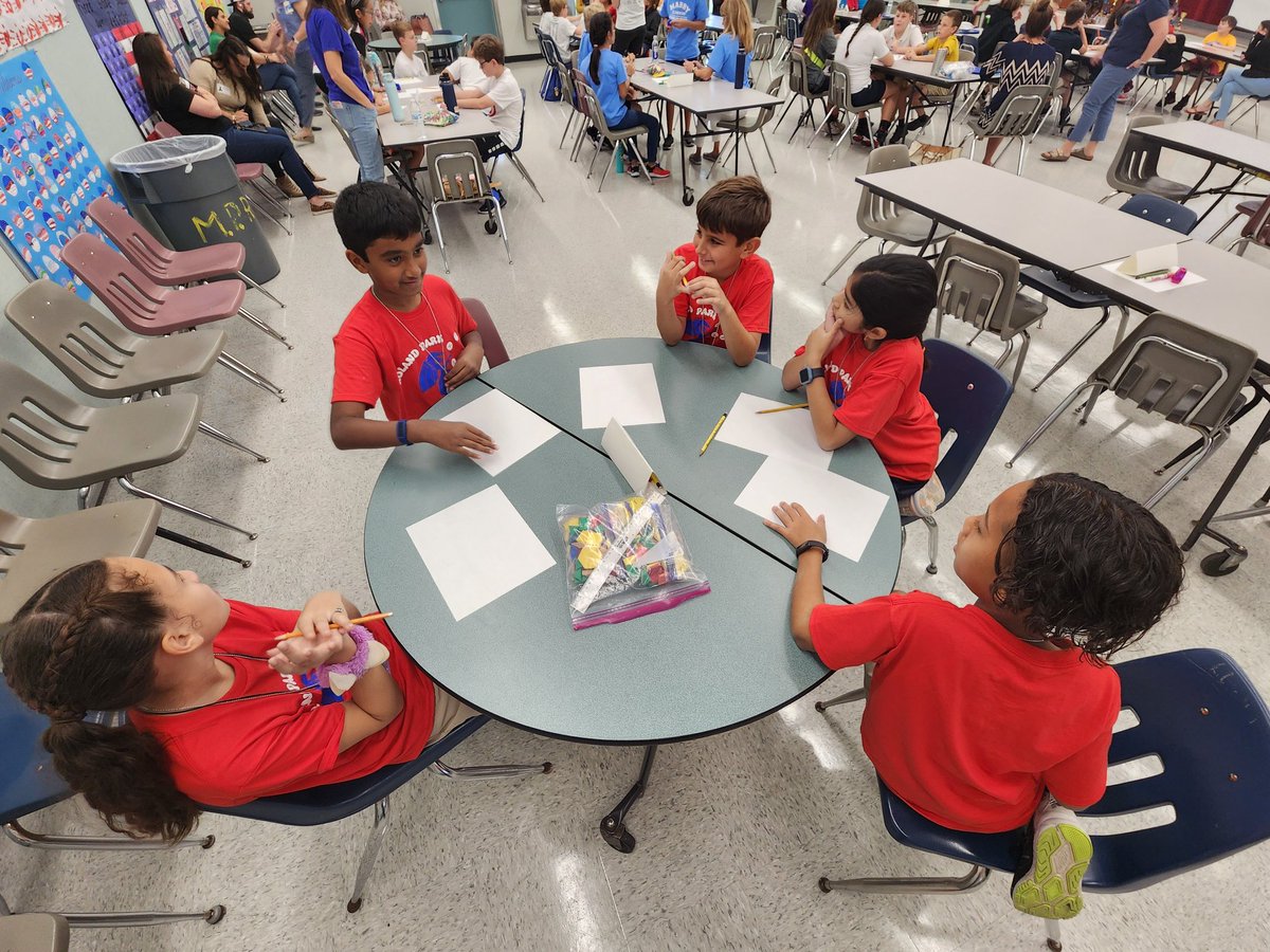 mdavidson916's tweet photo. Ready to rock Math Bowl! 5th graders having a final strategy session before competing against area schools. @rpk8magnet @PTSARolandPark @CvonAncken @WeAreHAEST https://t.co/LFJDjeXn6M