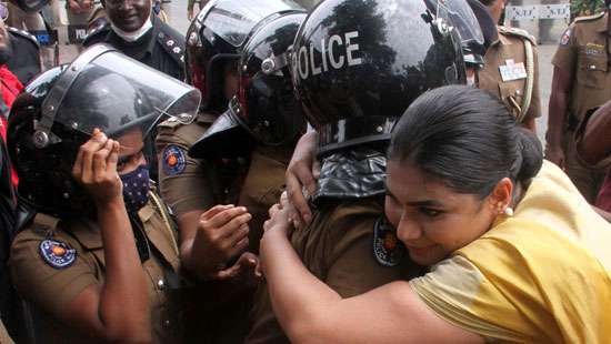SJB member Hirunika Premachandra hugs police officers during protests as a tactic to make them uncomfortable, police told court today.

ASP Nevil de Silva informed court that she has done this many times &amp; police believe this is her modus operandi #SriLanka