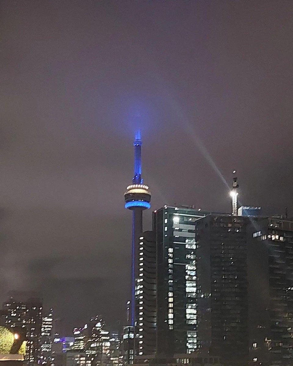 SGRho's tweet photo. The CN Tower lit in Blue and Gold over the weekend for Centennial. 💙💛🐩
 
#SGRho #SigmaGammaRho #SGRho100 #Greater #SGRhoCentennial #SigmaGammaRho1922 #CNTower https://t.co/K9IvEajVq0