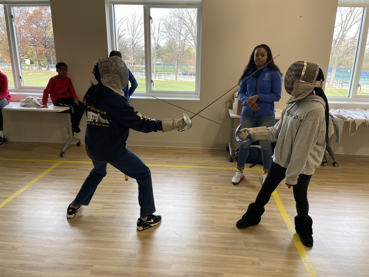 PCMiddle's tweet image. Dr. Thompson teaching 8th graders the fundamentals of fencing!