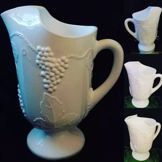 #etsy shop:Indiana MilkGlass,GrapeLeaf Pitcher etsy.me/3UDMXUZ #embossedgrapes #harvestgrape #newyears #grapesandleaves #icelipspout #indianaglass #milkglass #milkglasspitcher #whiteglass #barware #pedestalpitcher #princesspitcher #party #artglass #artdeco #art