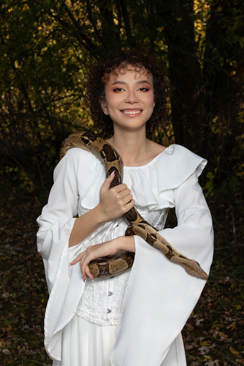starloft's tweet photo. Do you have a pet? I am happy to create portraits of you with your favorite furry or scaly animal! My client wanted to be photographed with her 7-foot pet snake! https://t.co/KBdFQ8qLWP