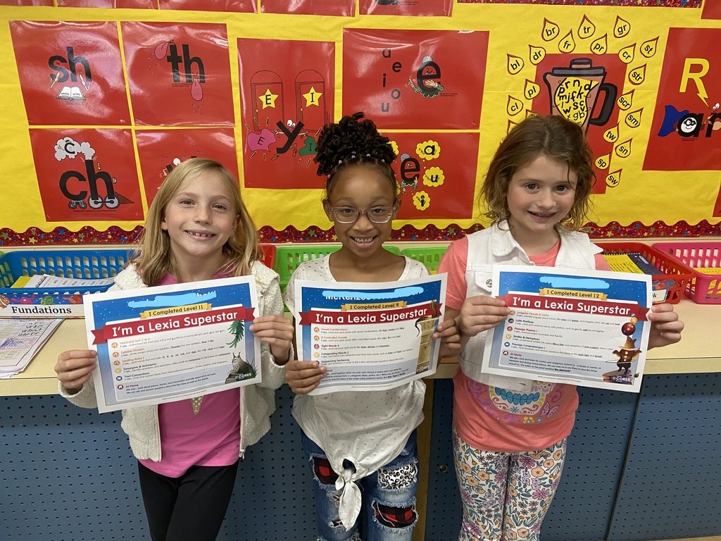 Just a few of Mrs. Yacovone's Lexia Superstars showing off their latest achievement! Go Tigers!
