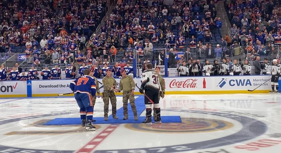 106thRescueWing's tweet photo. Our pararescuemen represented the 106th during the New York Islanders Military Appreciation Night as they rappelled from the rafters to perform the ceremonial puck drop for the game! https://t.co/qLy9CCfWSk