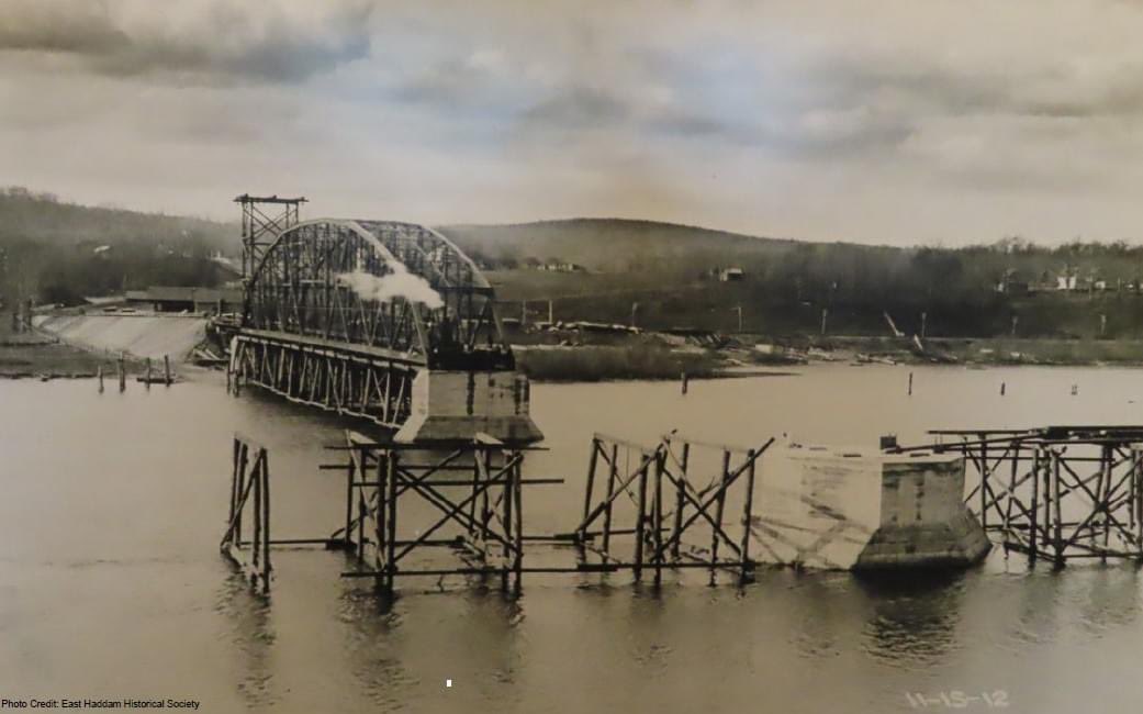 HaleRayAlumni's tweet photo. 110 years ago, this photo was taken to capture the construction progress of the Bridge.  The view looks towards Haddam shows the span 2 bridge section and pivot constructed with temporary bridge shoring being installed prior to construction of the swing span portion of the bridge https://t.co/ljL9uiDrxn