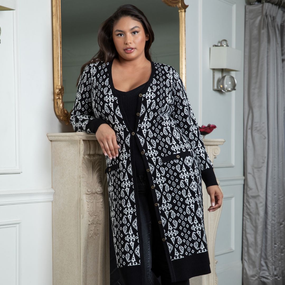 Home for the Holidays has a whole new meaning when it comes to cozy.  Long cardigans in an all over print add a great splash of fashion to your style all year long. 

The holiday deals have begun!
Belldini.com