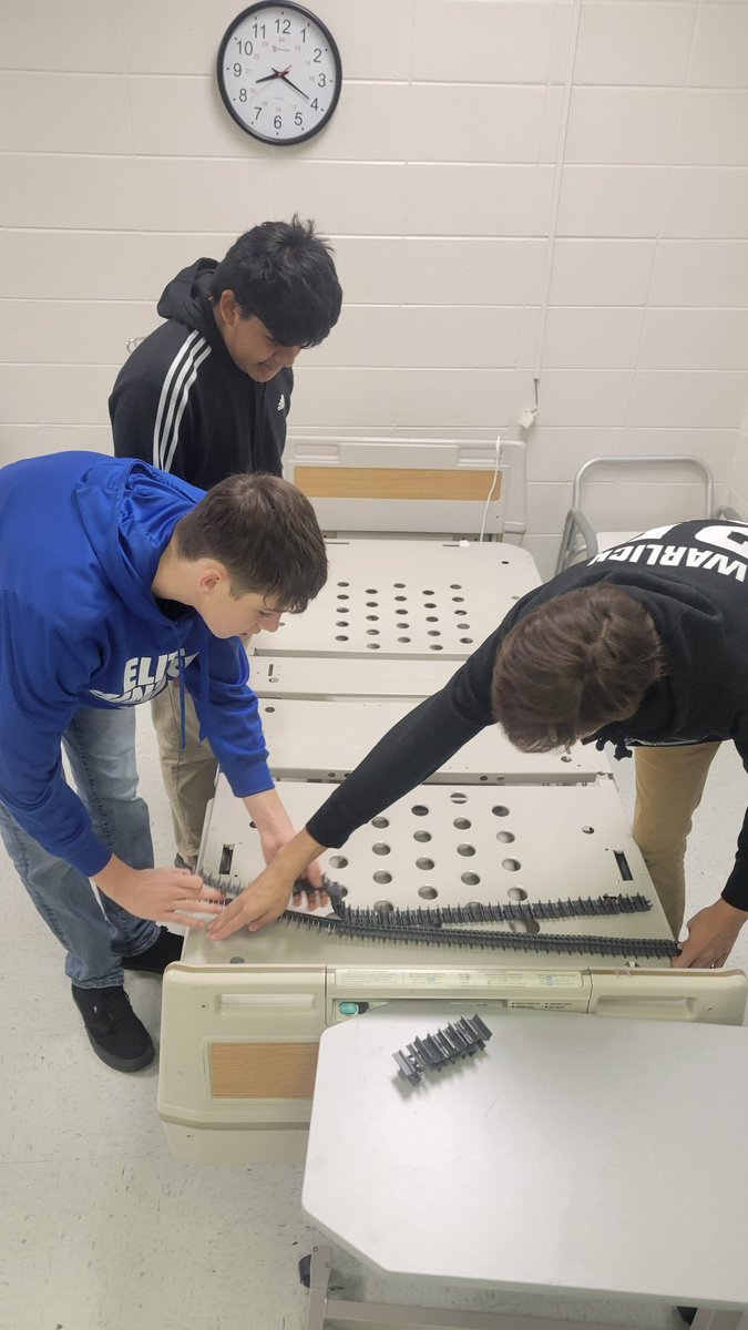 HealthCare2B's tweet photo. Medical innovation. That's what this group chose for their HOSA competition and I could not be more proud of their success. They have raided old engineering supplies to design this set of bed tracks which reduces the work load of health care workers when moving patients. https://t.co/dfV5foJJbj