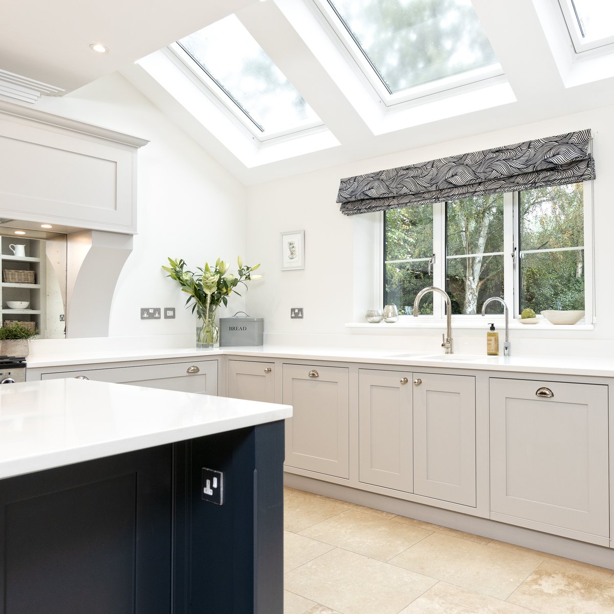 Would you two tone in your home? There are no rules that say all the units need to match, sometimes it's better when they don’t. In this large kitchen, introducing the deep blue contrasts beautifully with the light white. This keeps the space feeling open and airy.