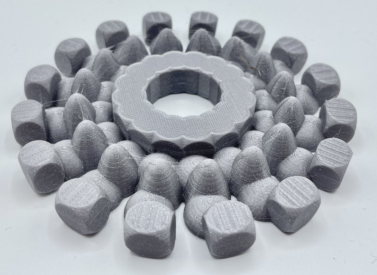 reidgreenblue's tweet photo. As part of the process of learning how to use @tinkercad the 4th graders had a very fun detour exploring radial symmetry. Our new @Prusa3D printers really made these prints look amazing. #pypdesign #makered #3Dprinting https://t.co/jOn5ZGC6mt