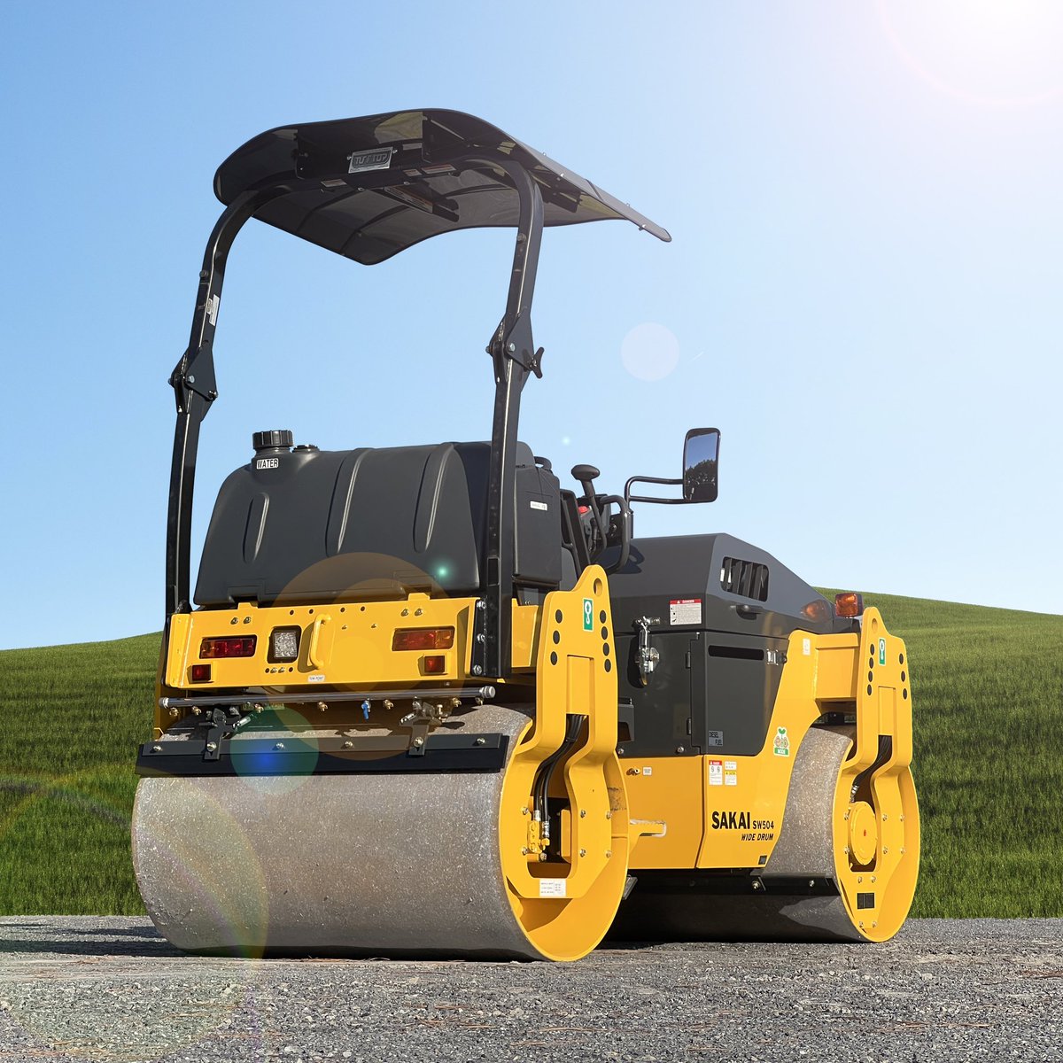 The #SAKAI SW504 wide drum variant has 54” drums instead of 51” &amp; an operating weight of just over 4.5 tons. It’s powered by a 43hp Kubota T4 engine &amp; is ideal for #driveway jobs, #parkinglot #paving, local roads &amp; road maintenance. This #asphalt roller is shown w/optional canopy