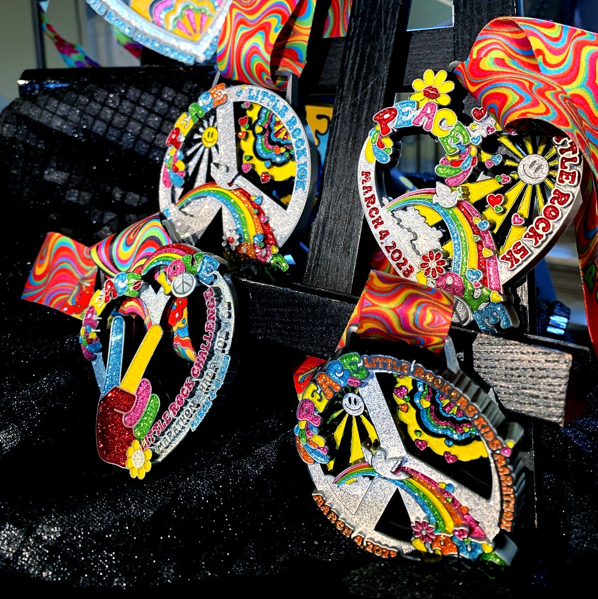 The medals for the 2023 Little Rock Marathon Weekend are super groovy! ✌🏽🌼🏅🌸🫶🏼🌼 If you haven't seen them yet, scroll through to take a peek!

Theme: Peace ☮️ Love ❤️ Little Rock Marathon! <a href="/LRMarathon/">Little Rock Marathon</a>

🏃🏻‍♀️Visit the Little Rock Marathon website: littlerockmarathon.com