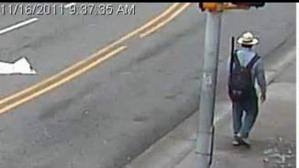 NES_Professor's tweet photo. Happy 11th Gunbrella-versary! Eleven years ago today ECU campus police spotted student Jimmy Callaway's umbrella protruding from his backpack via surveillance cams, mistook it for a rifle, and initiated a campus-wide lockdown. He later posed with the parasol that started it all. https://t.co/LFufgKIxBE