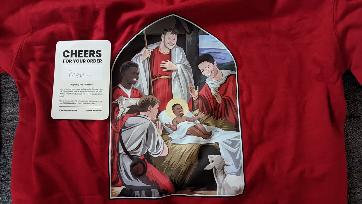 brettclaxton's tweet photo. To the mystery person that sent me this excellent Arsenal nativity jumper with no prewarning that something was in the post thank you very much.

It's excellent.

If you would like your own you can use the code FORTHEFANS for 15% off https://t.co/670AFLQwIy
