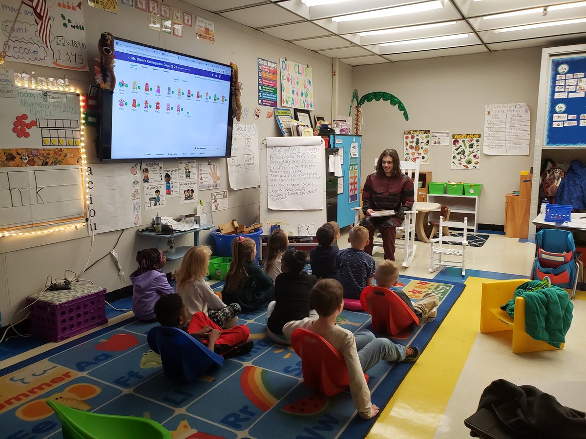 SpeakUpPHS's tweet photo. The #SpeakUp super heroes have made it to the Kindergarten classes of PES and are reading them some stories! Pre-K is next! https://t.co/MZC7SrD1DD