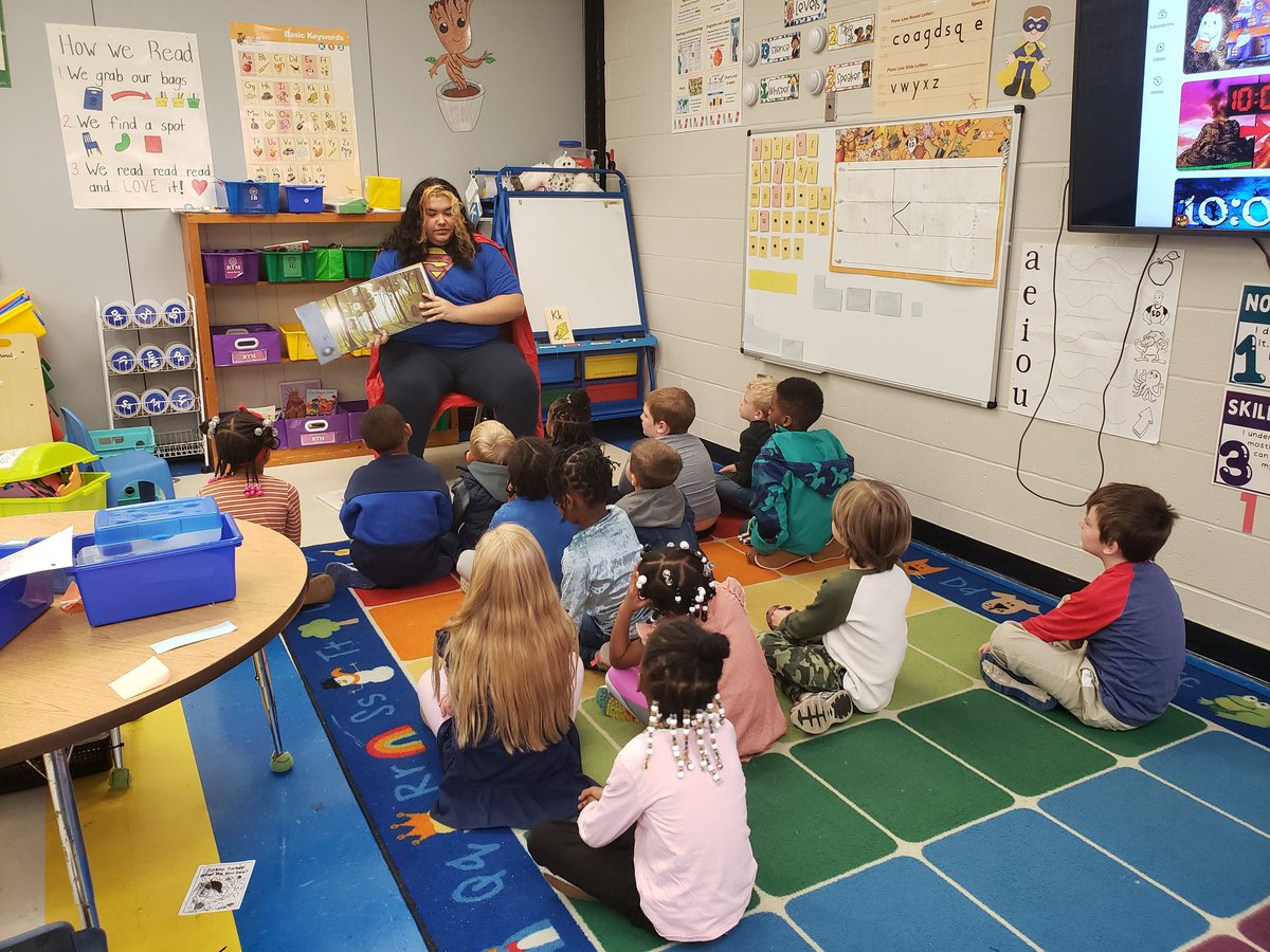 SpeakUpPHS's tweet photo. The #SpeakUp super heroes have made it to the Kindergarten classes of PES and are reading them some stories! Pre-K is next! https://t.co/MZC7SrD1DD