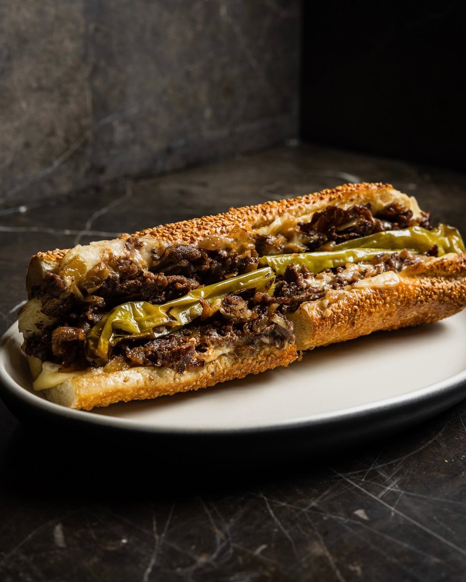 reveleinc's tweet photo. The Matū Philly Cheesesteak is now available for lunch service  at the Matū bar or pick-up via @postmates from 11:30am to 2:00pm Wed-Sun! For those who enjoy a cheesesteak at dinner, the Matū bar will serve them nightly from 5:30pm to 7:30 pm.#MatuSteak https://t.co/UBaaEnT3OY