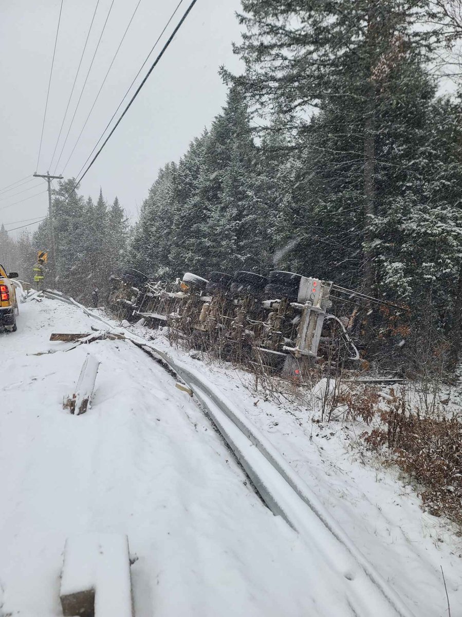 HarveyFireDept's tweet photo. #HVFD has cleared the scene.  DTI, RCMP and flagging crew remain until the vehicle can be removed.  Continue to slow down and use caution in the area. @TrafficNB https://t.co/ludKQKiWse