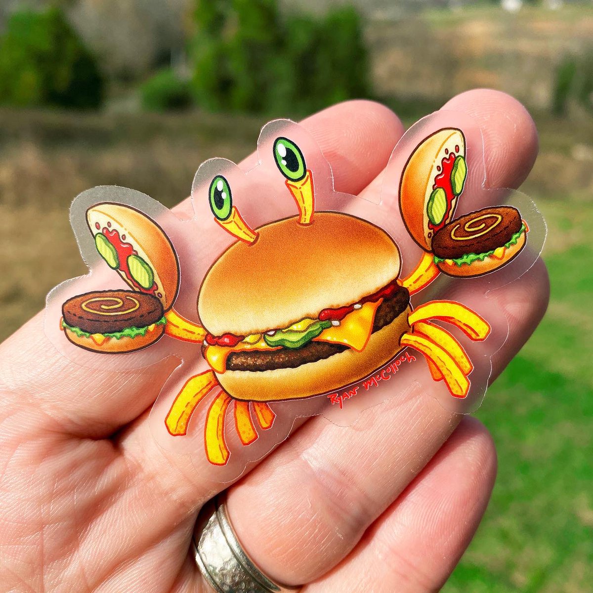 Studio1018's tweet photo. NEW “Beach Buns” Burger Crab transparent sticker just dropped today! This cute guy is one of the 4 new stickers available in my new “Snackimals” sticker pack!!!!

Shop link in bio!

#sticker #stickers #crabart https://t.co/JcyoFSvHmX