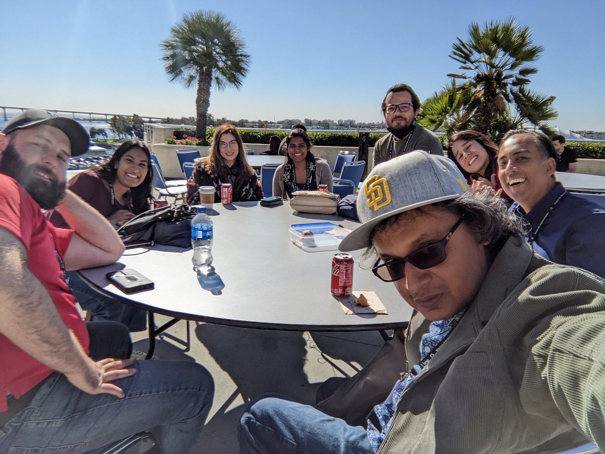 Hanging out on the balcony with lab peeps. <a href="/Rohantific/">Rohan Sharma</a> and <a href="/leonardoaparrar/">Leonardo Parra-Rivas</a> gave great talks. Big Brent (red T) still to come at 1:45 today. #SfN2022