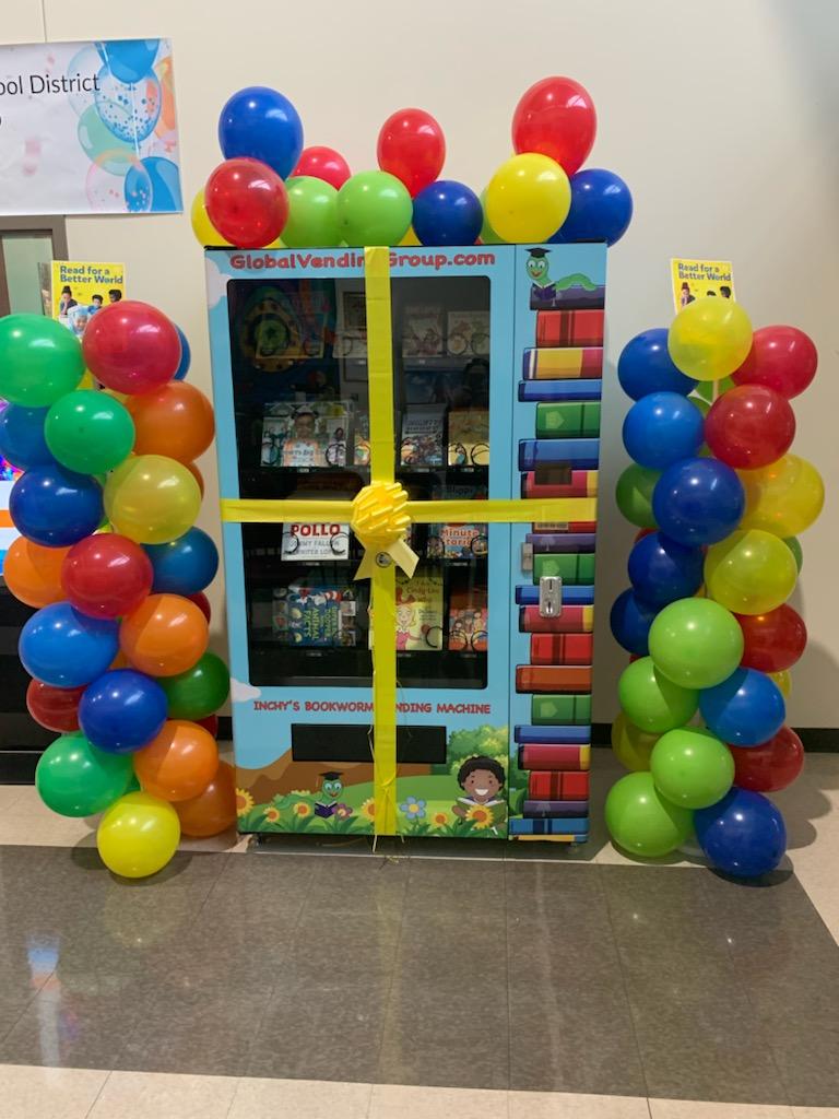 dcsdfamilyenga1's tweet photo. On November 15, 2022, @nancy_pritchett and the Department of Family and Community Empowerment hosted the Ribbon Cutting of the IMPACT (INCHY) Bookworm Vending Machine. Our goal is to promote literacy and excite students to read. @DeKalbSchools #BookwormMachine https://t.co/WDiqIzJVzh