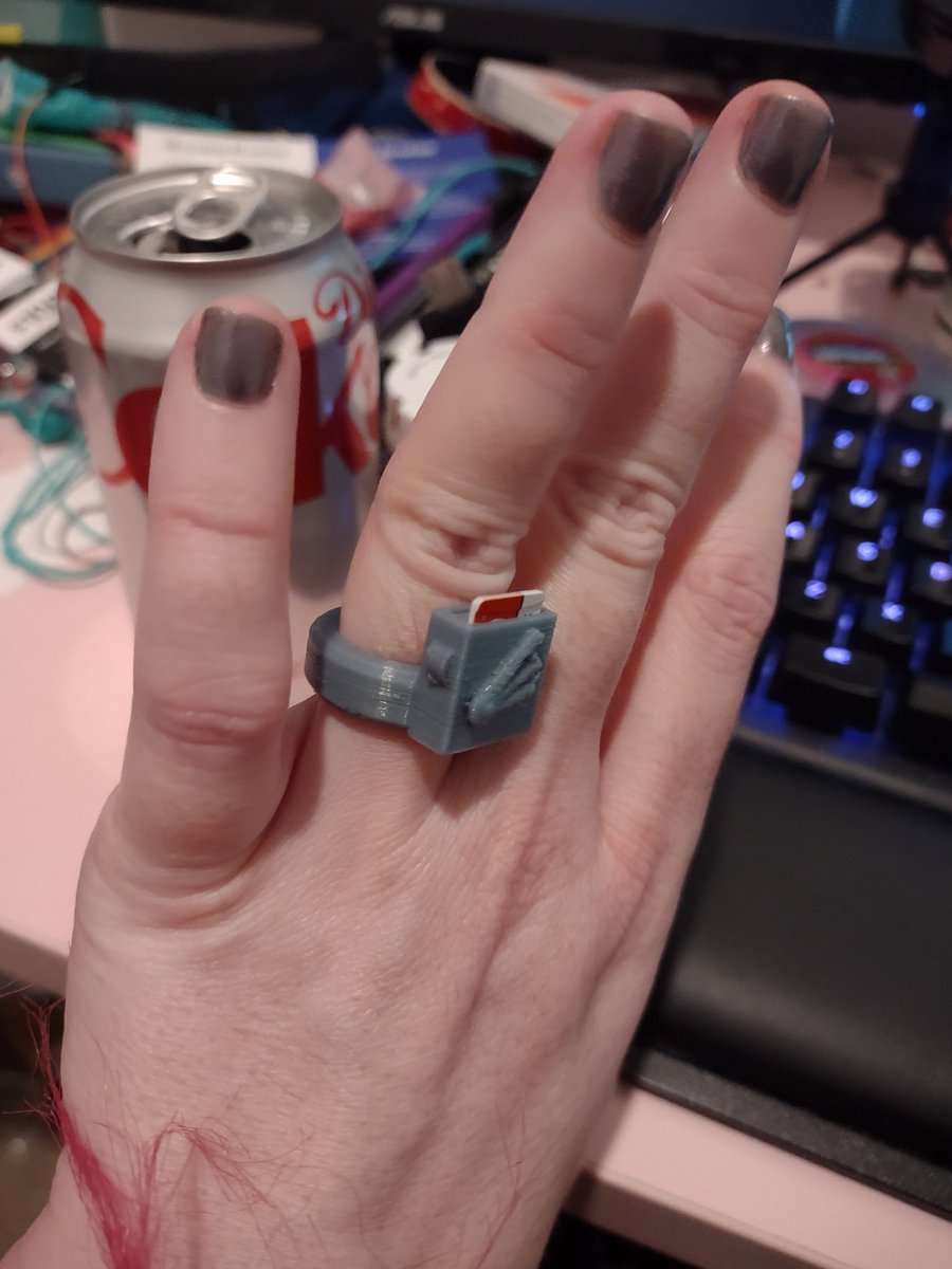 VirtualPilotLt's tweet photo. I've been avoiding posting here but this is how the flying toaster microSD card ring is coming along! Can hold 2 microSD cards, fits a size 7. Printed in about 30 minutes. #3dprinted #3dprinting #flyingtoasters https://t.co/ATSMvdPFaX