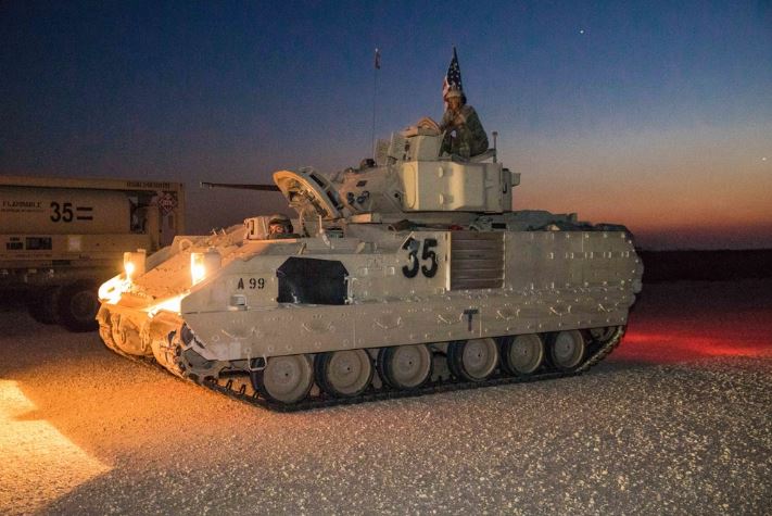 CJTFOIR's tweet photo. #TBT: (Nov. 2019), @USArmy Soldiers from #30thABCT provided M2A2 Bradley fighting vehicles in support of OIR's anti-ISIS mission in eastern Syria. The mechanized infantry partnered with @cmoc_sdf to deter ISIS operations & deny ISIS access to revenue sources. #AdviseAssistEnable https://t.co/oXr93OK35Q