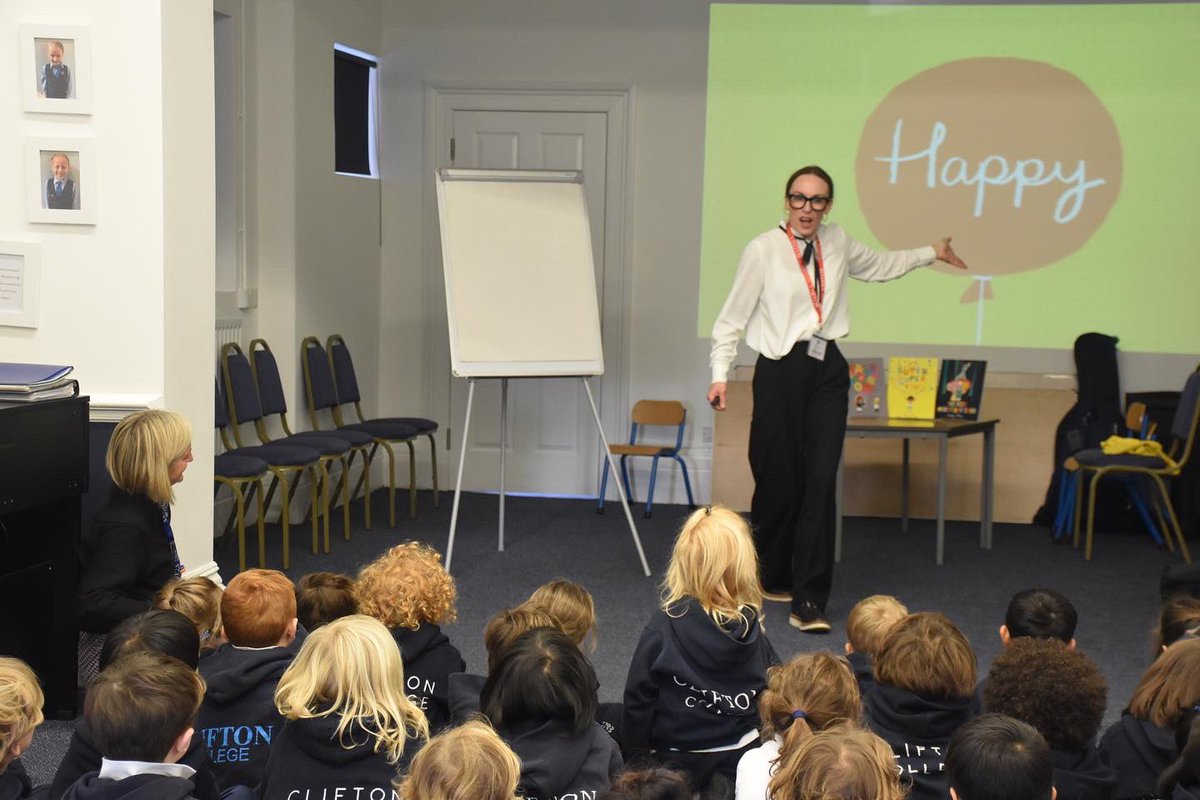 Clifton_College's tweet photo. What an honour to welcome @sophyhenn to Clifton College today.

She kicked off a wonderful session with Reception, where they discussed what things make them happy before having a go at drawing their very own Pom Pom Panda 🐼 

#cliftoncollege #education #reading #books #author https://t.co/tC9VAYyKZq