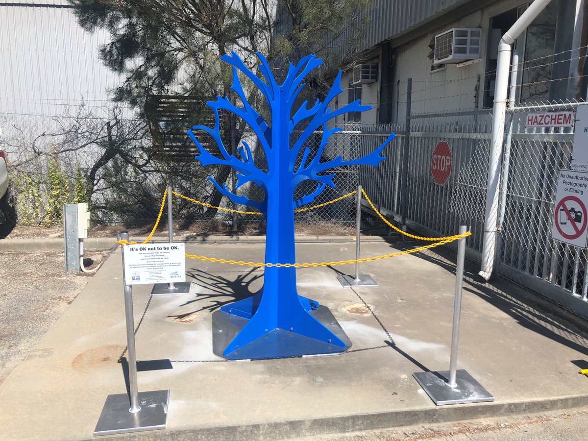 austal's tweet photo. The @Austal π¦πΊ #team are showing support for the #BlueTreeProject by fabricating & installing unique aluminium trees, painted #blue, that spread the message across our Australian shipyards and offices that #itsokaytonotbeokay... #mentalhealth #conversations #savelives https://t.co/bT9Qge9vPb