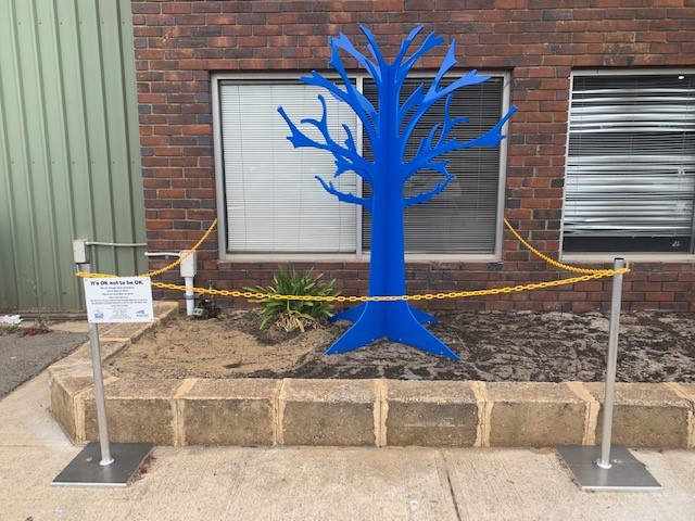 austal's tweet photo. The @Austal π¦πΊ #team are showing support for the #BlueTreeProject by fabricating & installing unique aluminium trees, painted #blue, that spread the message across our Australian shipyards and offices that #itsokaytonotbeokay... #mentalhealth #conversations #savelives https://t.co/bT9Qge9vPb