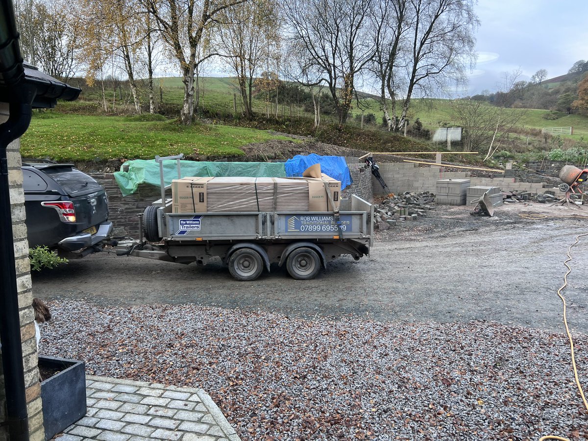 A man has arrived with a new floor for the house.