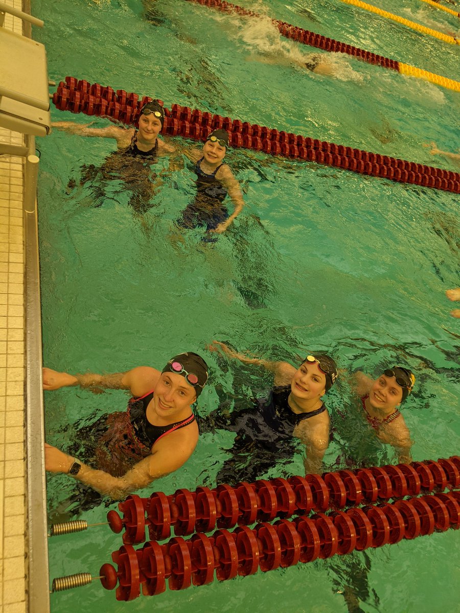 Smiling and warming up for state prelims! 🏊‍♀️ Let's go Tigersharks! 🐯🦈 <a href="/HutchActivities/">Hutchinson HS Activities Department</a> #tigersharks #stateswimming