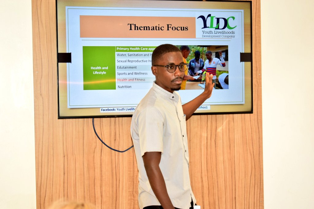 e_foundationUg's tweet photo. #Throwback : @moses_musanzi, one of our volunteers doing a presentation about our mother organization @YouthLivelihoo1 to @DanishMFA and DUF delegates about the work done as organizations. 

#EmitiEmitoFoundation https://t.co/8kbg076fRg