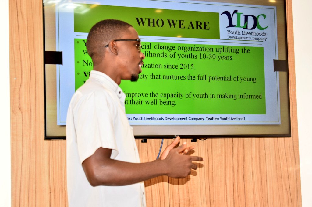 e_foundationUg's tweet photo. #Throwback : @moses_musanzi, one of our volunteers doing a presentation about our mother organization @YouthLivelihoo1 to @DanishMFA and DUF delegates about the work done as organizations. 

#EmitiEmitoFoundation https://t.co/8kbg076fRg