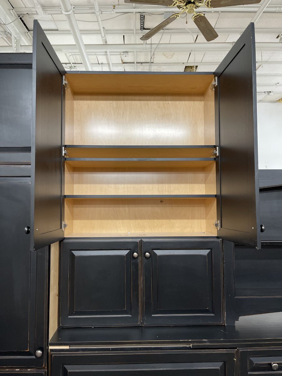 BuildingValue's tweet image. This cabinet set is hand-crafted showcasing an elegant raised-panel style. Frameless with fully overlayed doors that are solid wood with a deep and dark walnut stain featuring a rustic furniture-quality finish. This is an extraordinarily well-built and beautiful cabinet set.