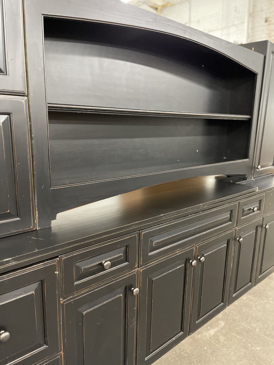 BuildingValue's tweet image. This cabinet set is hand-crafted showcasing an elegant raised-panel style. Frameless with fully overlayed doors that are solid wood with a deep and dark walnut stain featuring a rustic furniture-quality finish. This is an extraordinarily well-built and beautiful cabinet set.