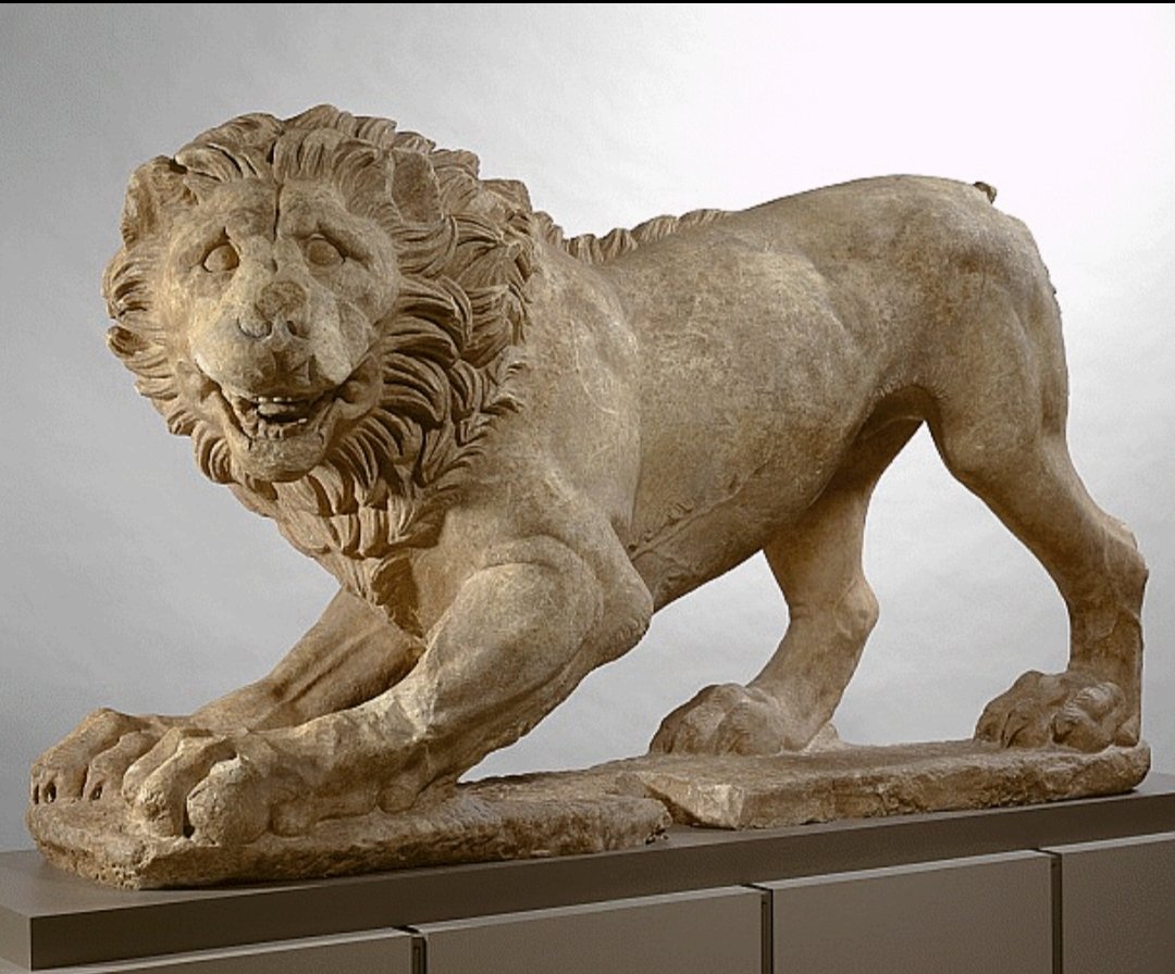 Statue of a lion. From Attica, Greece. Dated 325 BC. Made of Pentelic marble and weighing over 1360 kgs, this massive lion, shown in a threatening stance, once guarded the entrance to a cemetery in Athens. Nelson Atkins Museum